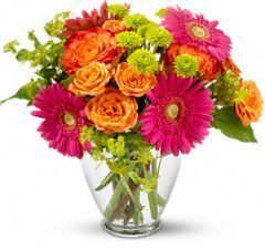 pink gerbera daisy, bi-colour roses, orange, green button mums, summer bouquet